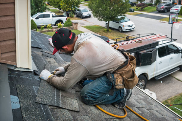 Professional Roofing technician working in Red Hill, PA